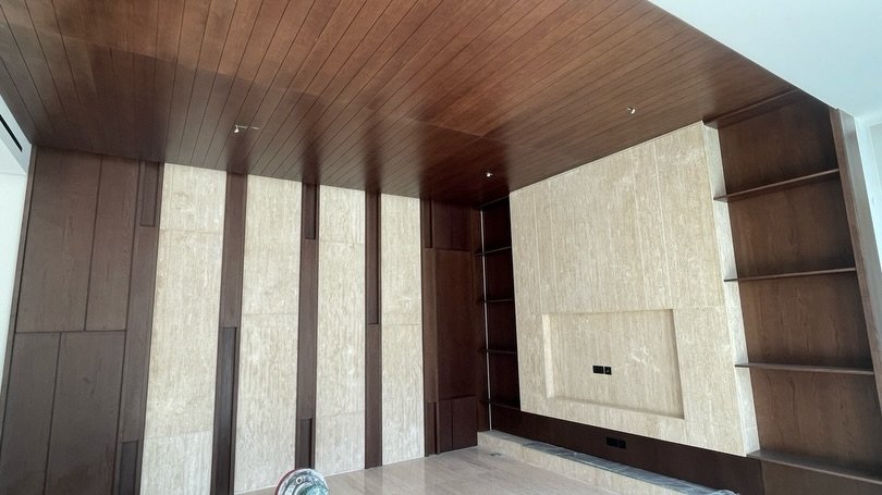 Completed fitted interior with wood, stone and built-in storage by Star of Future Sky